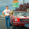 classic car cruise, man posing with car downtown